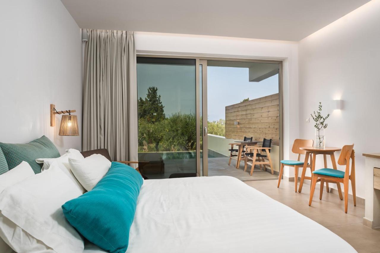 Tsamis Zante Suites (Adults Only) Psarou  Bagian luar foto A room at the hotel