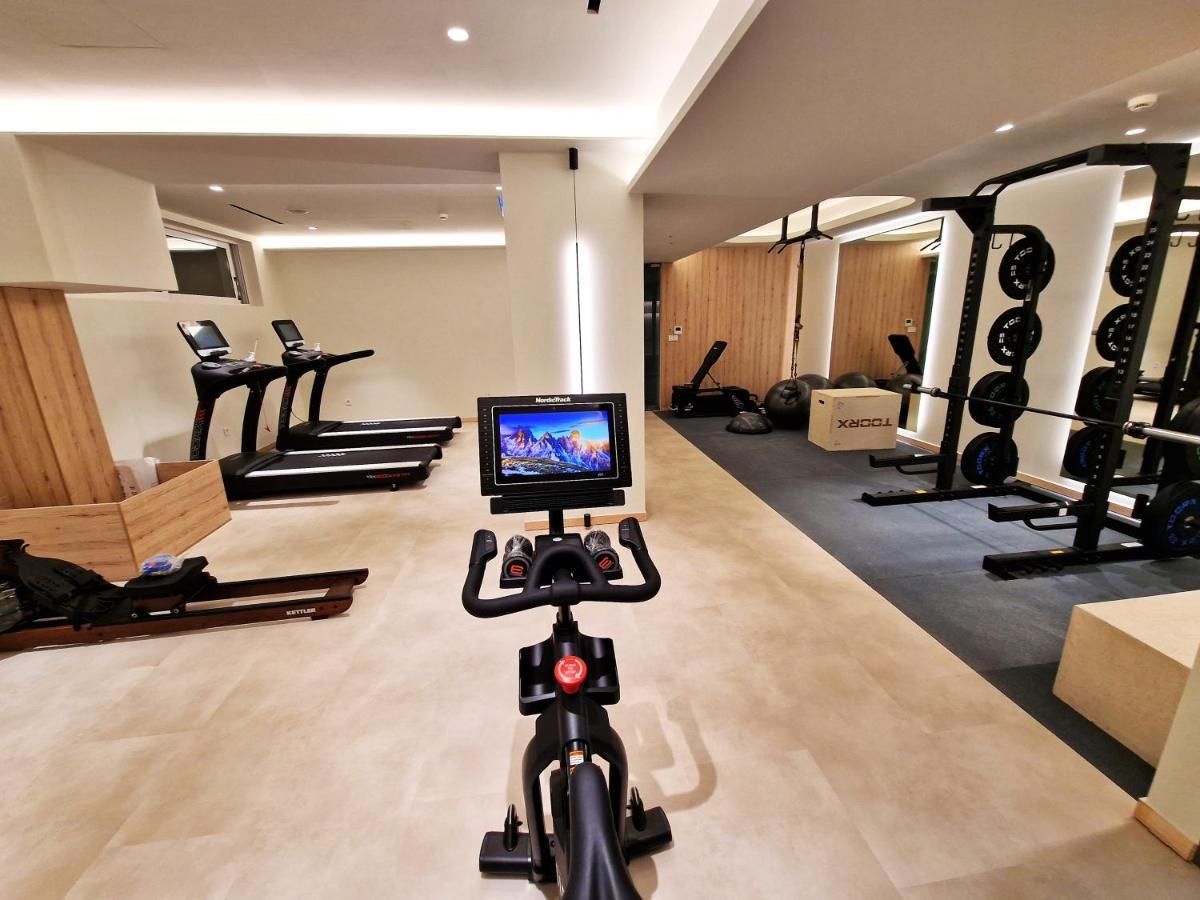 Tsamis Zante Suites (Adults Only) Psarou  Bagian luar foto Peloton Bike in a gym