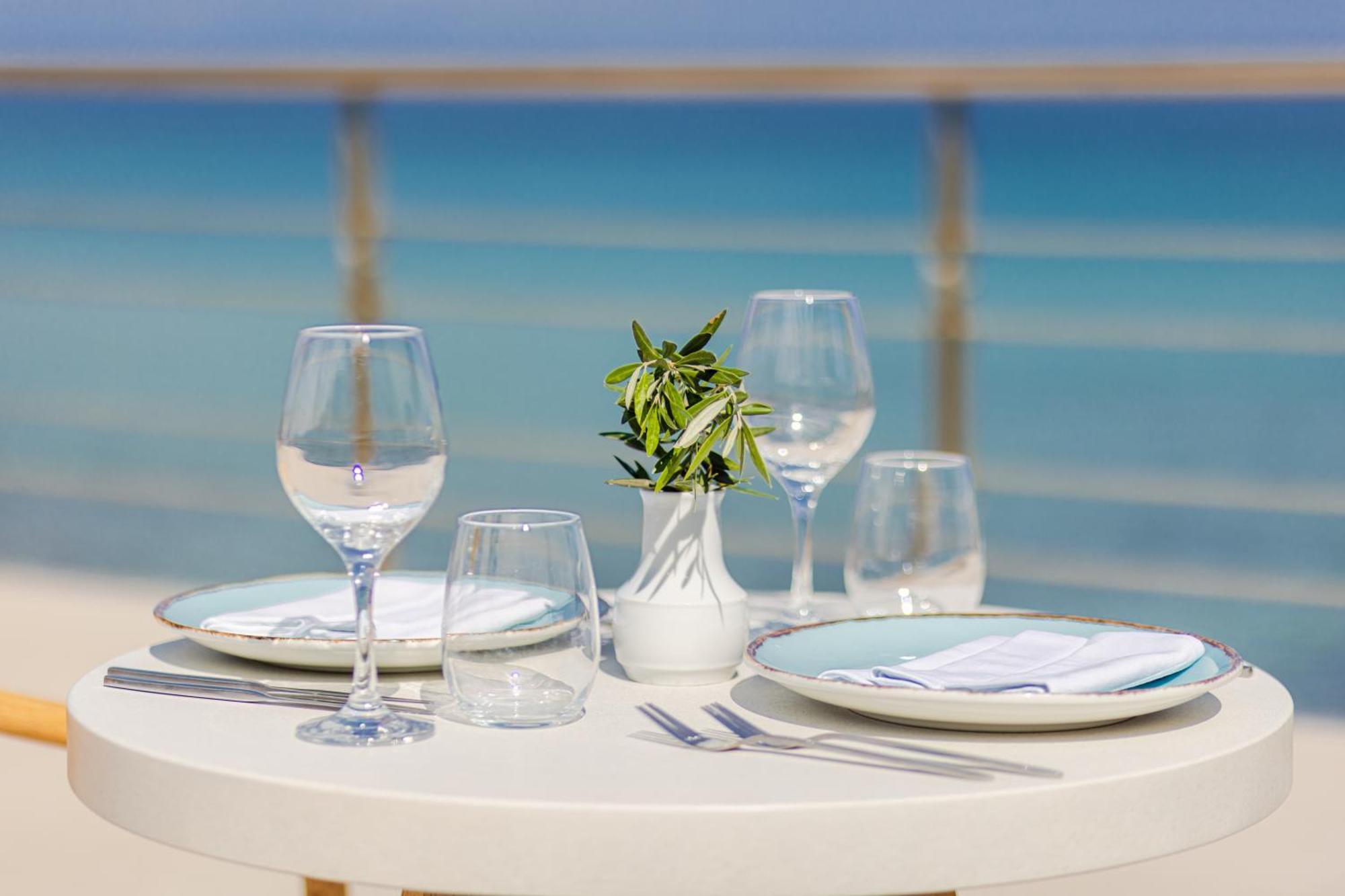 Tsamis Zante Suites (Adults Only) Psarou  Bagian luar foto A table set for fine dining