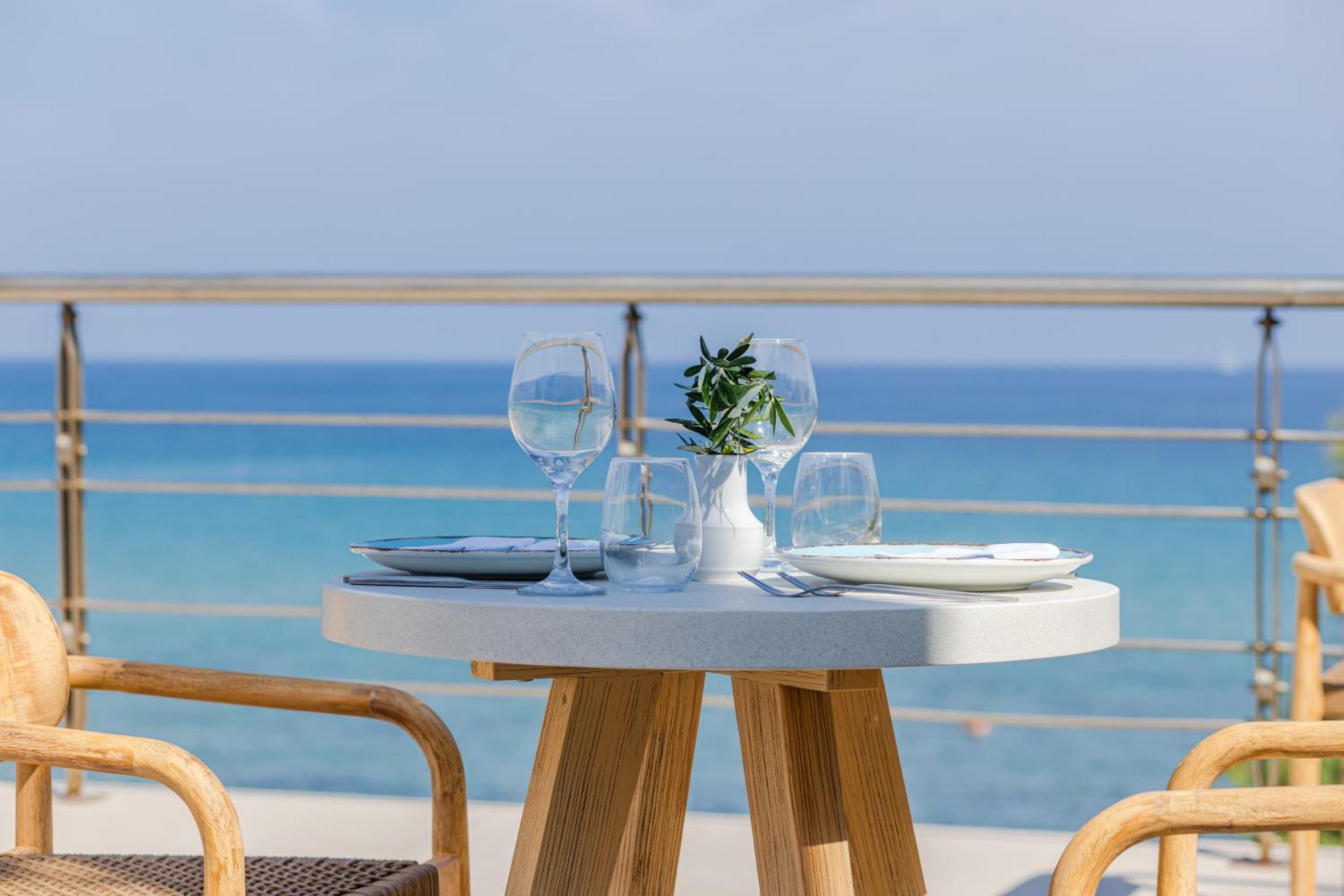 Tsamis Zante Suites (Adults Only) Psarou  Bagian luar foto A table set for fine dining
