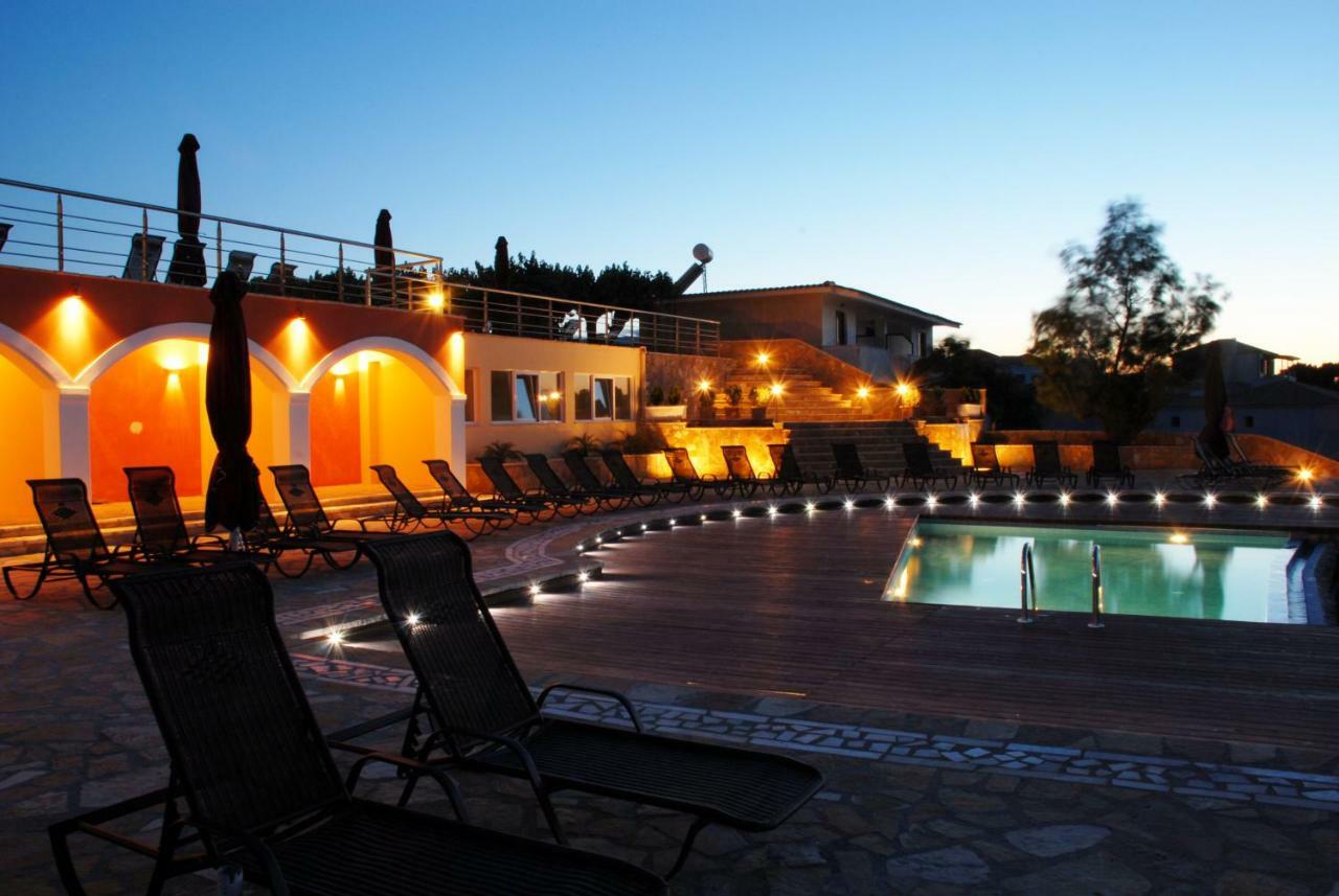 Tsamis Zante Suites (Adults Only) Psarou  Bagian luar foto The pool at the hotel